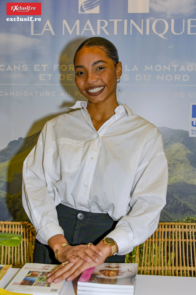 Le sourire de Séverine Vetro, au stand de la Martinique